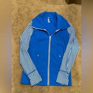 Lululemon zip up jacket in size 6.  Blue body with striped sleeves. Barely worn